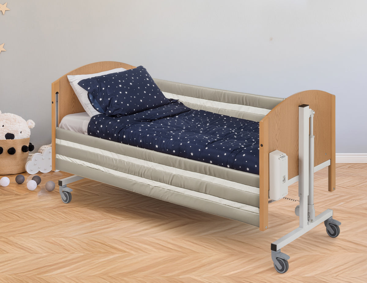 Bradshaw Junior bed rail pads shown installed on a compatible bed. Bed sold separately.