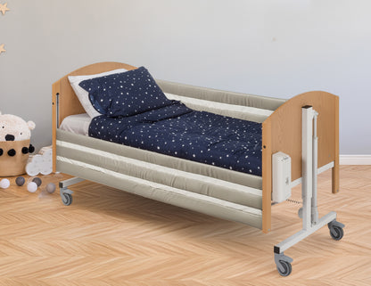 Bradshaw Junior bed rail pads shown installed on a compatible bed. Bed sold separately.